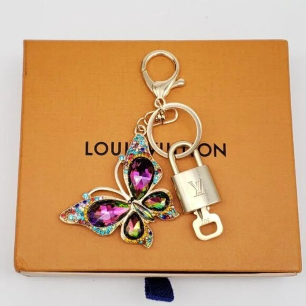 Authentic Louis Vuitton Gold Lock & Box w/ Unbranded Butterfly Bagcharm 122725